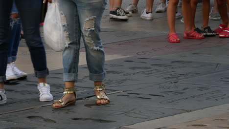 Los-Angeles-Golden-Sandals-And-Tennis-Shoes-At-The-Hollywood-Walk-Of-Fame