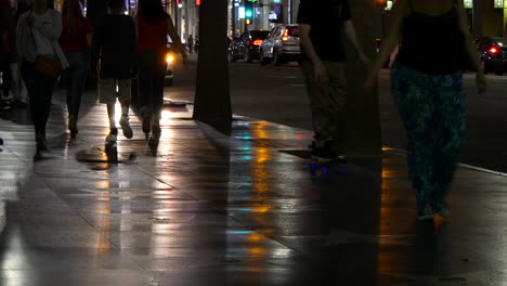 Los-Angeles-Pedestrians-On-Hollywood-Sidewalk-At-Night-With-Skateboarder