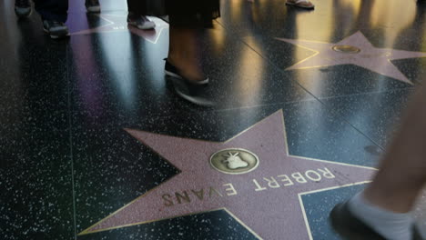 Los-Angeles-Tilts-Up-From-Stars-On-The-Hollywood-Walk-Of-Fame