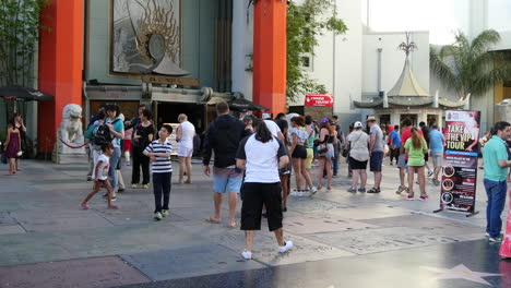 Los-Angeles-Tilts-Up-From-Tourists-In-Front-Of-Chinese-Theater