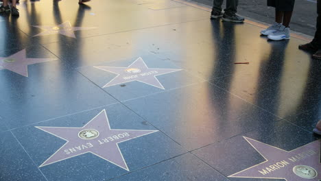 Los-Angeles-Tourists-Walk-Across-Stars-On-The-Hollywood-Walk-Of-Fame