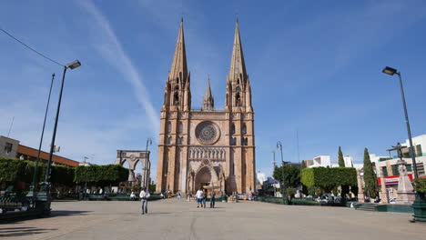 Mexico-Arandas-Crippled-Man-In-Plaza-With-Church
