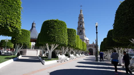 Mexico-San-Julian-Church-Tower-And-Plaza-With-Little-Boy