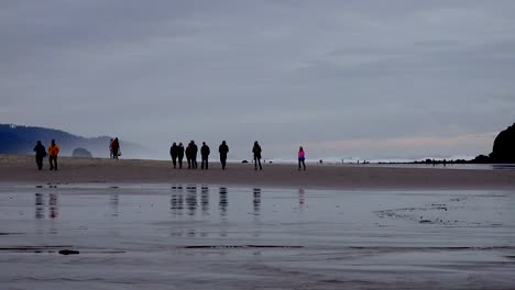 Oregon-People-On-Beach-After-Sunset-Zooms-In
