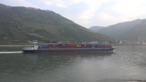 Germany-Rhine-Gorge-Container-Barge-In-Morning-Mist