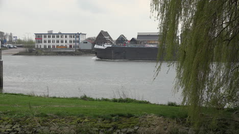 Netherlands-De-Lek-With-German-Barge