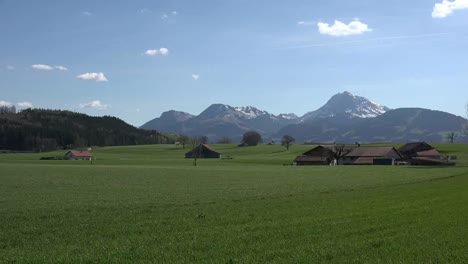 Switzerland-La-Gruyere-Landscape-With-Barn-Zoom-In