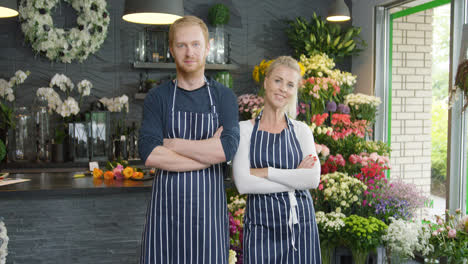 Cheerful-people-posing-in-shop