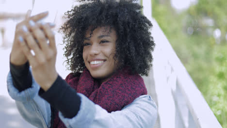 Young-black-woman-taking-selfie