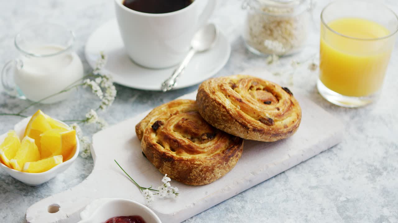 Premium stock video - Sweet buns on board for breakfast