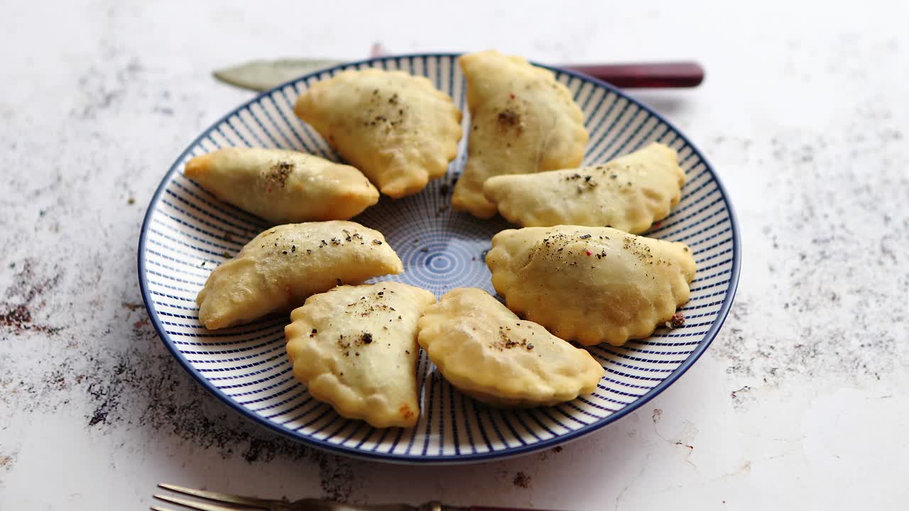 Premium stock video Hot and tasty deep fried polish dumplings with