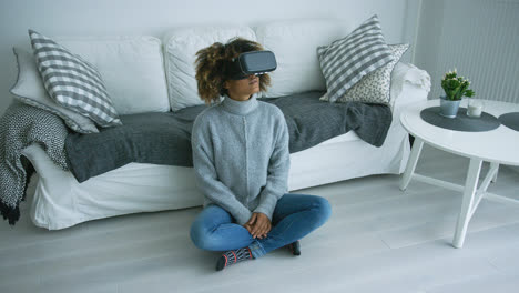 Woman-in-VR-glasses-at-home