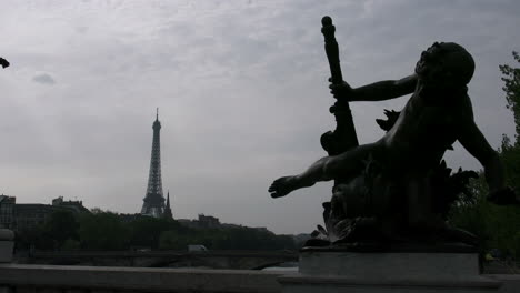 Paris-Eiffel-Tower-from-Paris-Pont-Alexandre-III-Statue-with-dramatic-pose
