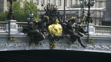 Paris-Pont-Alexandre-III-statue-of-women-by-ship-emblem