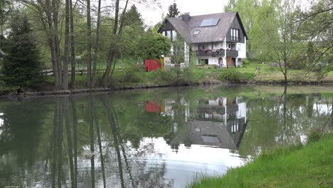 Germany-farm-house-reflected-in-pond