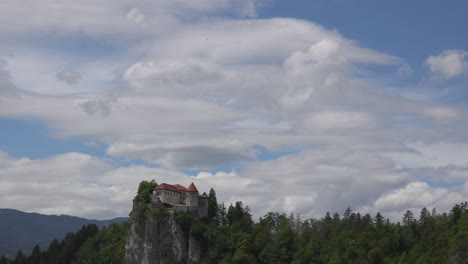 Slovenia-clouds-moving-above-castle-at-Bled-time-lapse