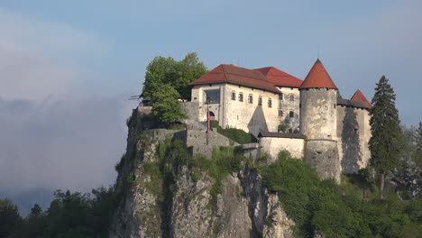 Slovenia-morning-light-on-castle-above-Bled