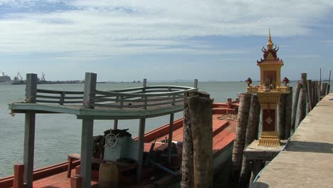 Cambodia-spirit-house-and-boat