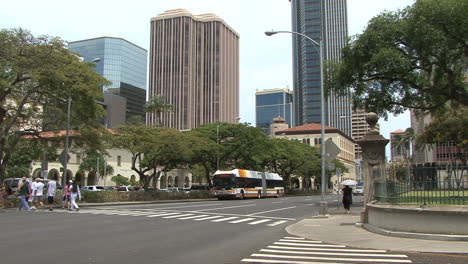 Honolulu-crossing-street-and-tall-buildings-2