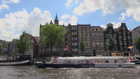 Netherlands-Amsterdam-black-and-white-canal-boat-moving