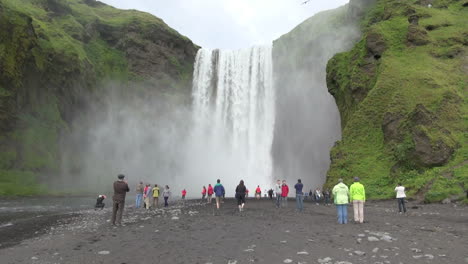 Iceland-Skogafoss-waterfall-with-tourists