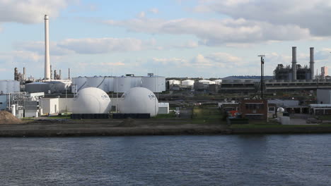 Netherlands-Rotterdam-refinery-globe-tanks-reverse-against-stack