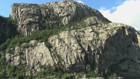 Norway-passing-a-cliff-above-Lysefjord-s