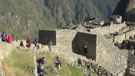 Machu-Picchu-tourists-approach-a-gate