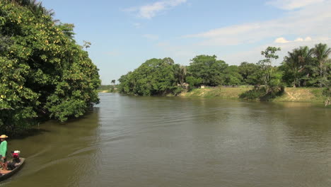 Brazil-Amazon-backwater-near-Santarem-men-in-canoe-s