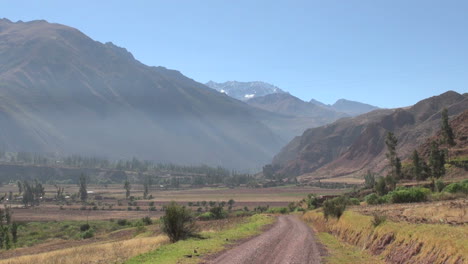Peru-Sacred-Valley-dirt-road-toward-Andean-peak-10