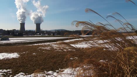 Smoke-rises-from-the-nuclear-power-plant-at-Three-Mile-Island-Pennsylvania-with-farm-fields-foreground