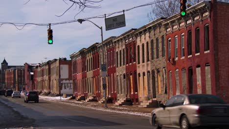 Traffic-passes-in-front-of-a-slum-in-an-American-city-1