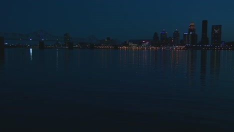 Beautiful-shot-of-Louisville-Kentucky-across-the-Ohio-River-at-night-1