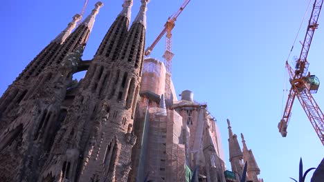 Low-angle-view-of-Sagrada-Familia-cathedral-by-Gaudi-under-construction-in-Barcelona-Spain
