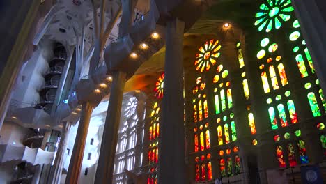 Sunlight-streams-through-stained-glass-in-the-beautiful-interior--of-the-Sagrada-Familia-Cathedral-by-Gaudi-in-Barcelona-Spain-3