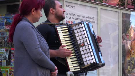 Street-musicians-perform-on-a-Barcelona-Spain-street