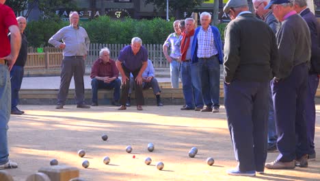 Retired-men-play-a-game-of-bowls-in-Barcelona-Spain
