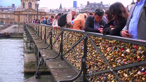 The-Pont-Des-Artes-bridge-in-paris-features-locks-from-couples-expressing-their-eternal-devotion-3