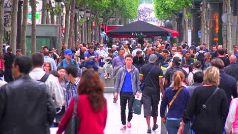 Crowds-of-people-walk-on-the-streets-of-Paris-France-1