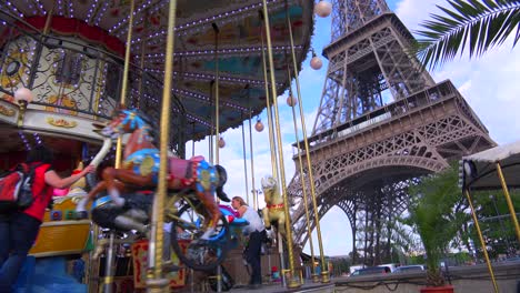 Tilt-up-from-a-Merry-Go-Round-to-the-Eiffel-Tower-Paris