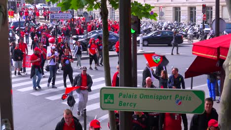 Rowdy-football-fans-celebrate-on-a-city-street-in-Europe-1