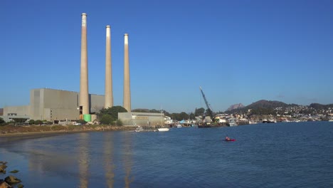 Smokestacks-from-a-power-plant-tower-over-Morro-Bay-California-1