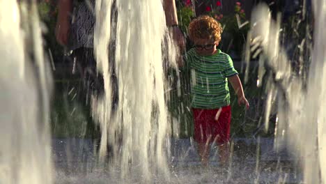 A-child-plays-in-a-fountain-in-downtown-San-Jose-California