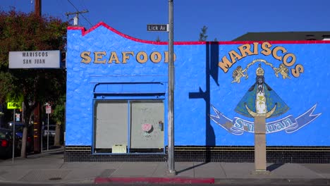 Establishing-shot-of-a-bright-blue-seafood-restaurant