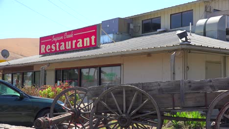 Establishing-shot-of-a-small-truck-stop-restaurant-along-an-American-highway-