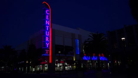 Establishing-shot-of-a-Century-movie-theater-sign-at-night