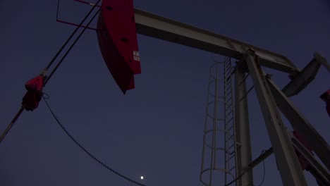 Low-of-an-oil-derrick-pumping-against-the-night-sky