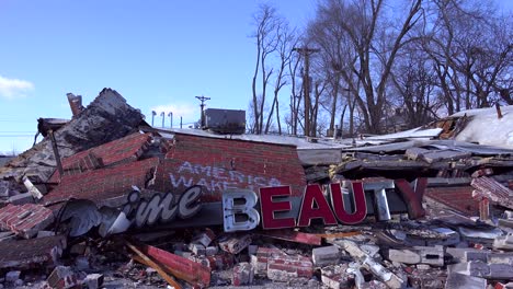 The-ruins-of-a-destroyed-beauty-salon-following-rioting--in-Ferguson-Missouri-make-an-ironic-statement-