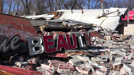 The-ruins-of-a-destroyed-beauty-salon-following-rioting--in-Ferguson-Missouri-make-an-ironic-statement--3
