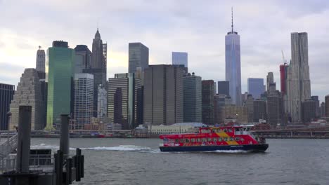 The-lower-Manhattan-region-with-a-water-taxi-passing